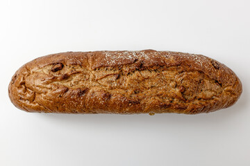 whole grain baguette on a white background