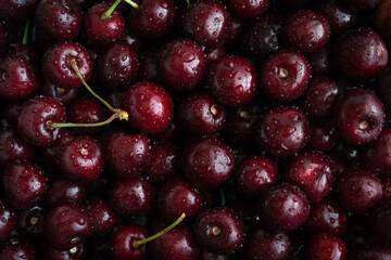 Cherries background. Cherry with drops. Food background.