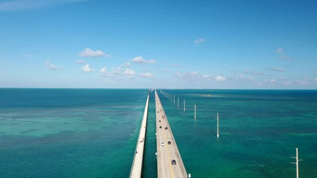 Vehicles Driving On Seven Mile Bridge Across Florida Keys In Monroe County, Florida. aerial