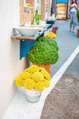 Beautiful decorated narrow streets and details of local products and souvenirs in Chora, Kythera island, Greece Urban photography of the picturesque Chora village in Kythera island