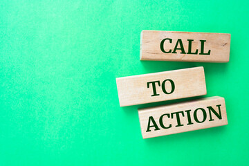 Wooden blocks with words 'CALL TO ACTION'.