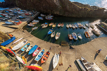 Beautiful small port in Liguria with many boats moored. Framura village, tourist resort on the coast of the province of La Spezia, Cinque Terre, Italy, southern Europe. - obrazy, fototapety, plakaty