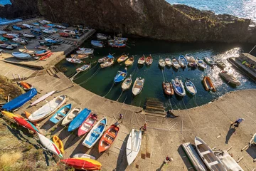 Tuinposter Beautiful small port in Liguria with many boats moored. Framura village, tourist resort on the coast of the province of La Spezia, Cinque Terre, Italy, southern Europe. © Alberto Masnovo