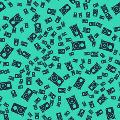 Black Stereo speaker icon isolated seamless pattern on green background. Sound system speakers. Music icon. Musical column speaker bass equipment. Vector
