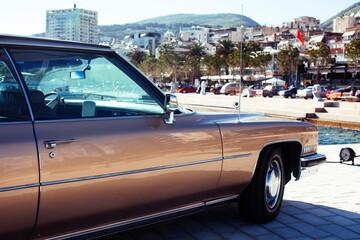 real old fashion cabriolet car at seaside touristic view lifestyle