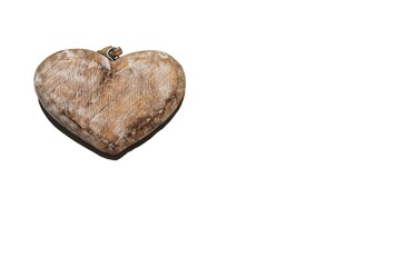 Wooden heart with a textured surface on a white background banner. Bright sunlight falls on the...