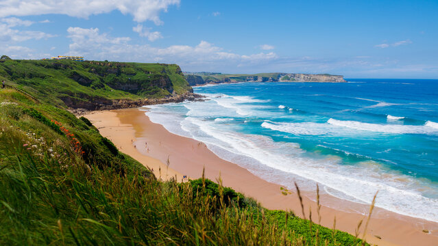Beatiful ocean coast in summer day. Spain, suburb of Suances, summer day in the Province of Cantabria, it is photographed from Playa de Los Locos