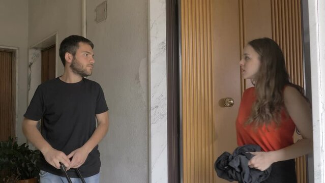 quarrelsome separation-man leaves home and his partner throws his clothes