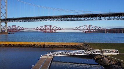 Fototapeta premium Aerial view of bridges crossing the Firth of Forth in Scotland. 