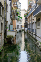 Fototapeta na wymiar Canal in Treviso city, Italy.