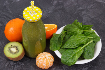 Freshly blended coctail from fruits and vegetables as healthy dessert containing vitamins and...