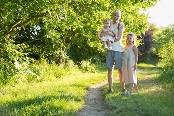 Fototapeta premium three children for a walk