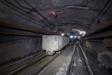 Fototapeta na wymiar Underground railway for transporting ore.