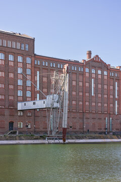 Former warehouse with loading equipment in the inner harbor of Duisburg