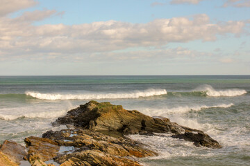 waves crashing on rocks