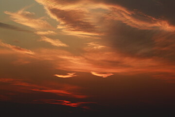 sunset in the clouds with red sky