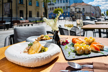 sushi and white wine outdoor