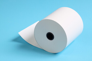 white paper rolls placed on a blue background.