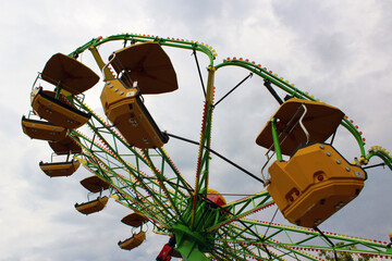 Empty ride in an amusement park on a cloudy day