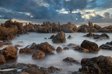 Fototapeta na wymiar rock formations in the ocean at sunset Tenerife