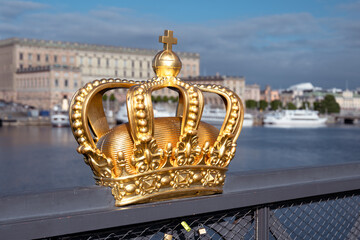 Fototapeta na wymiar Golden Crown of Skeppsholmen Bridge in Stockholm