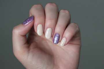 pink nails with purple glitter