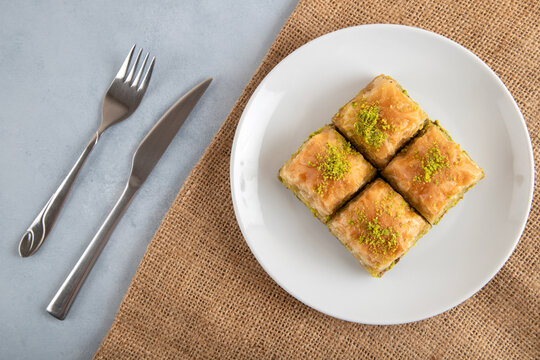 Pistachio baklava on a white plate