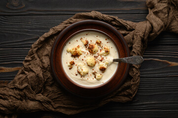 Creamy cauliflower soup with fried cauliflower and croutons.