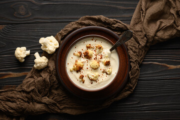 Creamy cauliflower soup with fried cauliflower and croutons.