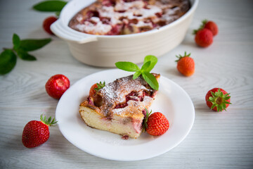 Sweet cottage cheese casserole with strawberry filling