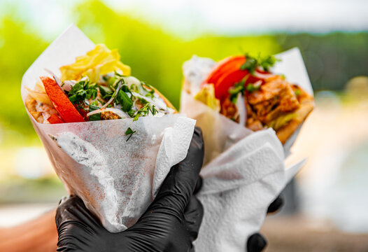 Greek Street Food Gyros In Man Hand Outdoor