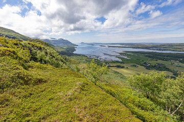 On a mountain hike to Kaukarpallen mountains a great summer day, Northern Norway- Europe	