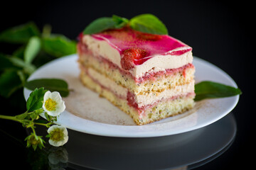 strawberry poppy cake with cream in a plate