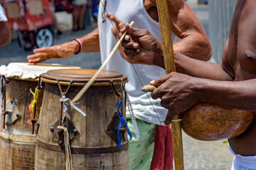 Brazilian musical instruments called berimbau and atabaque usually used during capoeira fight...