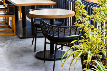 Table and chairs in front of the restaurant;