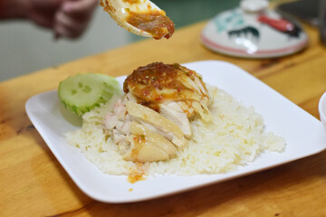 Steamed chicken with rice and spicy sauce