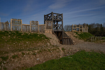 View of an antique wooden Roman fort built in North Wales on a sunny day - obrazy, fototapety, plakaty