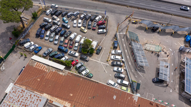 Aerial view on a car garage. This car demolition company is located on the outskirts of an Italian city.