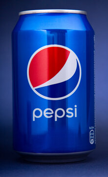Belgorod , Russia - MAY, 17, 2020: Pepsi drink in a can on ice isolated on blue background. Carbonated soft drink produced by PepsiCo.