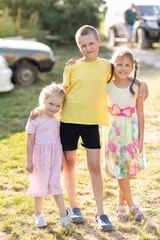 three children in the yard