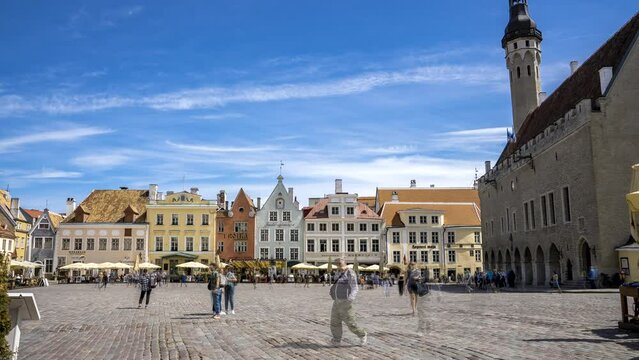 Timelapse of the main square in the middle of the old town of Tallinn, Estonia. People rushing though the streets of Tallinn.