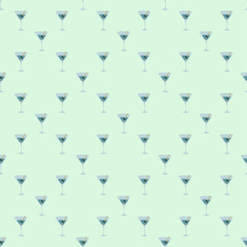 Martini glass with olive and skewer seamless pattern. Doodle style. Color hand drawn image. Repeat template. Party drinks concept. Freehand drawing. Cartoon sketch graphic draft