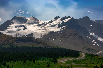 roadway up mountains beautiful landscape in Alberta Canada