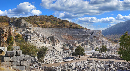 Ancient city ruins of Ephesus in Turkey surrounded by nature. Popular tourism attraction of the remains of well preserved historical stone building from classical greek and roman history and culture
