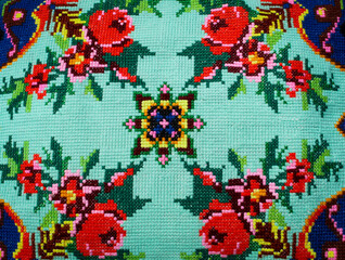 National Ukrainian cross-stitched ornament. Colored embroidered pattern. Background for Ukrainian holiday, presentation or postcard.