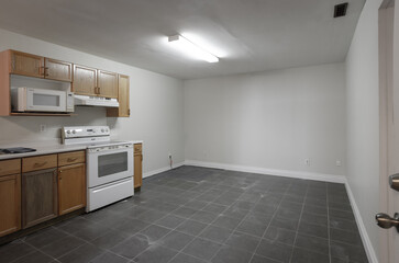 legal basement suite vacant dusty floor kitchen