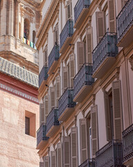 Balconies with wooden doors in a building