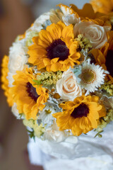 Bouquet of sunflowers and white roses