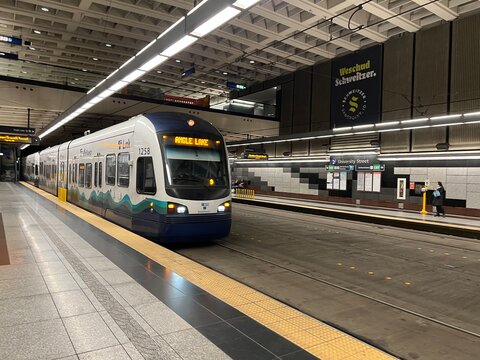 SEATTLE, WA, DEC 2021: modern train pulling into University Street station on light rail system in Downtown