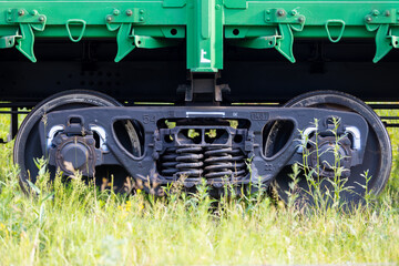 Wheelset of a freight railway car. Wheeled trolley of a train car. Wheelset is a pair of railroad vehicle wheels.